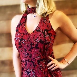 Red and black dress with neck band and open back.